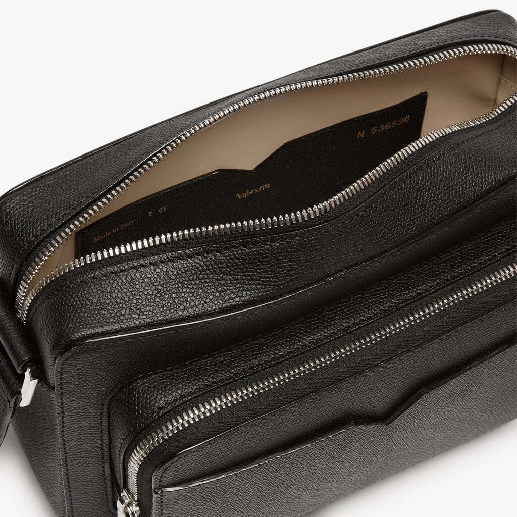 The Row Tasca Zip Crossbody Bag In Calf Leather in Black
