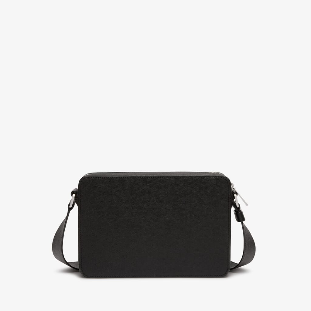 The Row Tasca Zip Crossbody Bag In Calf Leather in Black