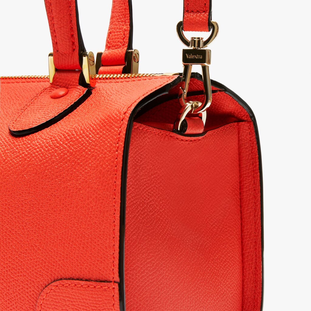 red leather luggage